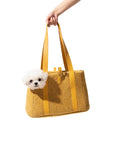 The Noel Tweed Carrier