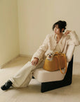 The Noel Tweed Carrier